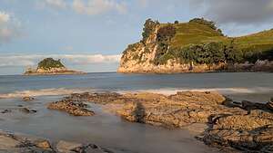Sunset walk along Hahei Beach